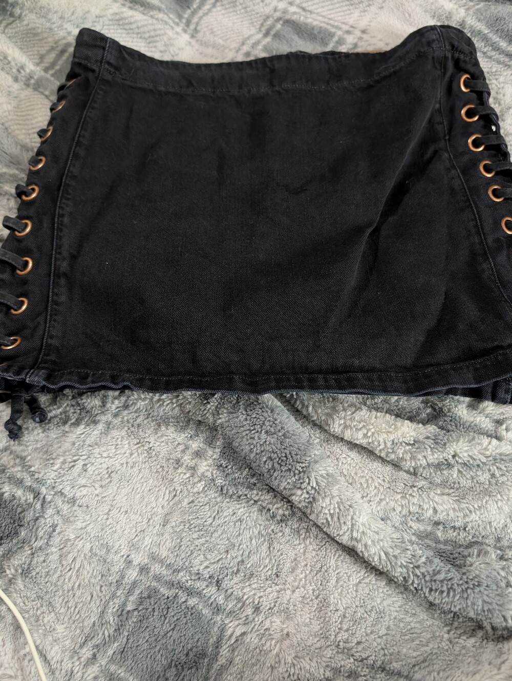 Tennis Brand Black denim mini skirt with lace-up detail. Size 10